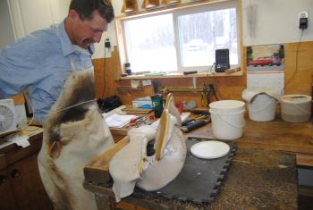 2016 July 26 6 Dusty Smith rawhiding a saddle tree.jpg